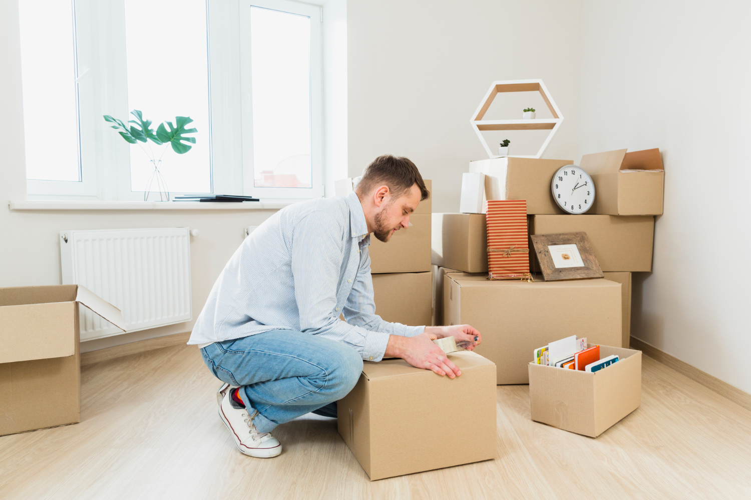 man with cardboard packing